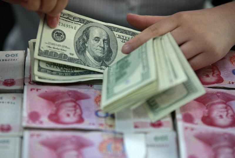 В США отвергли возможную угрозу для доллара со стороны юаня От Investing.com